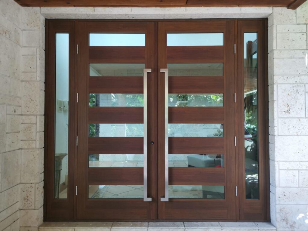 impact door shows a sleek, safe look with a mix of wood and glass.
