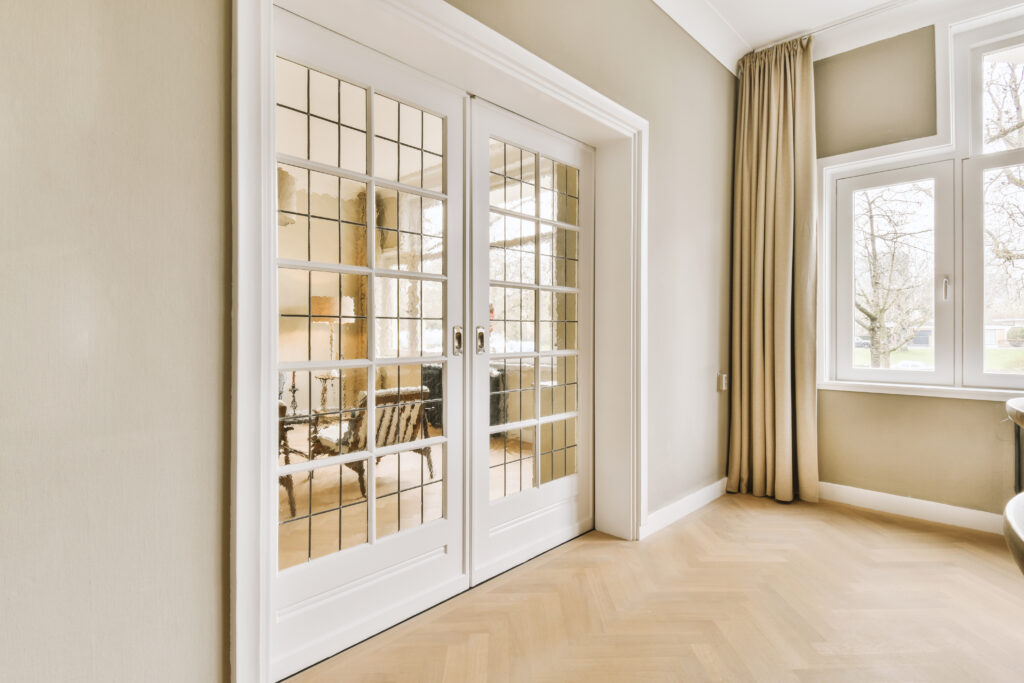 Sliding doors divide the rooms while keeping the space bright and open.